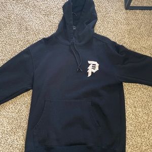 black naruto hoodie with a hint of orange and white in the mixture.